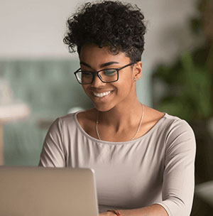 girl-with-glasses-on-laptop