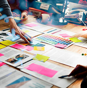 marketing audit consultants reviewing material.