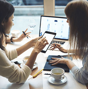 consultants working on web development services for every device