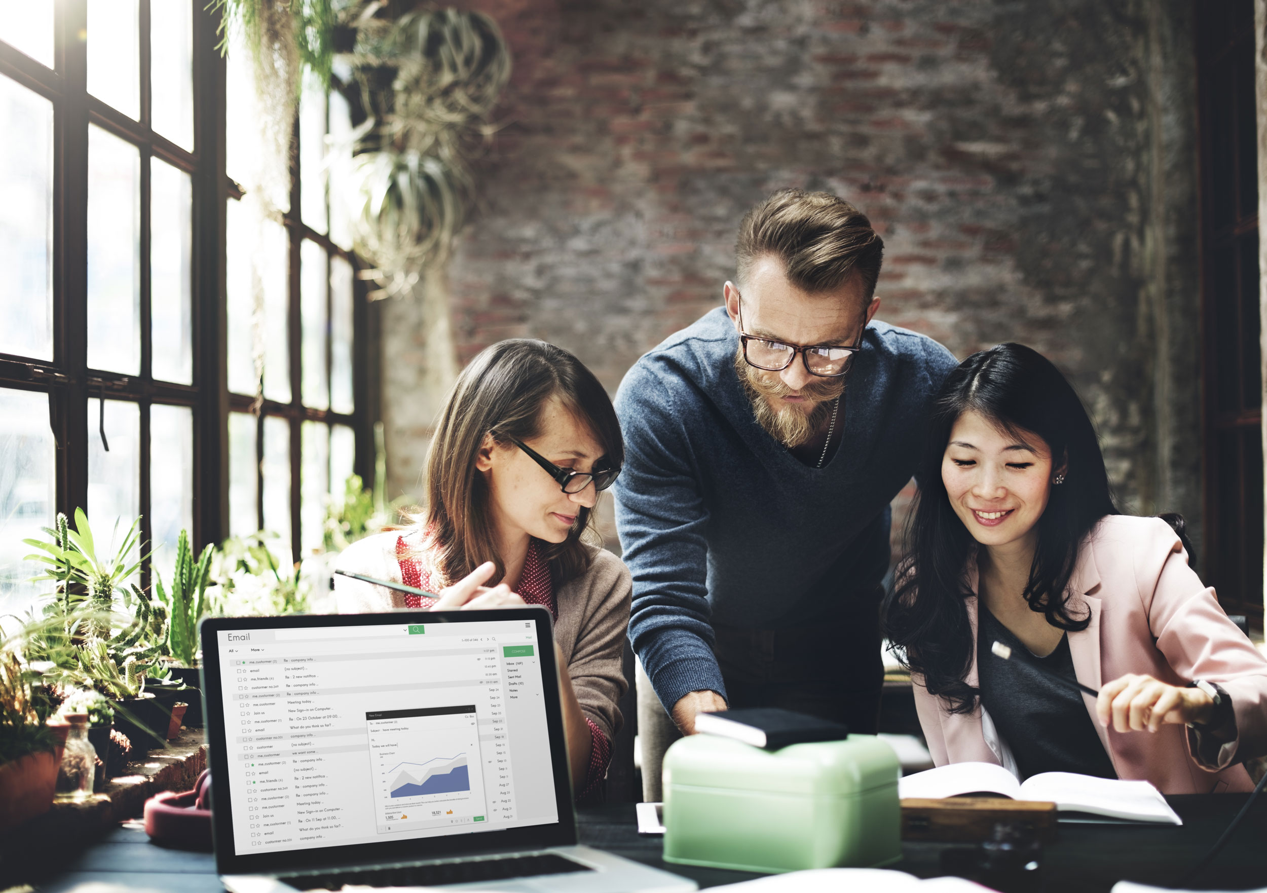 data-analytics-team-working-together-in-office